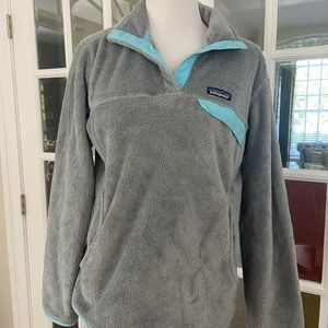 Patagonia pullover in gray with teal piping